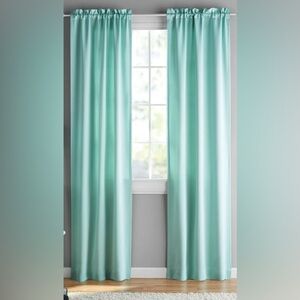 Your Zone Solid Mint colored black out curtains